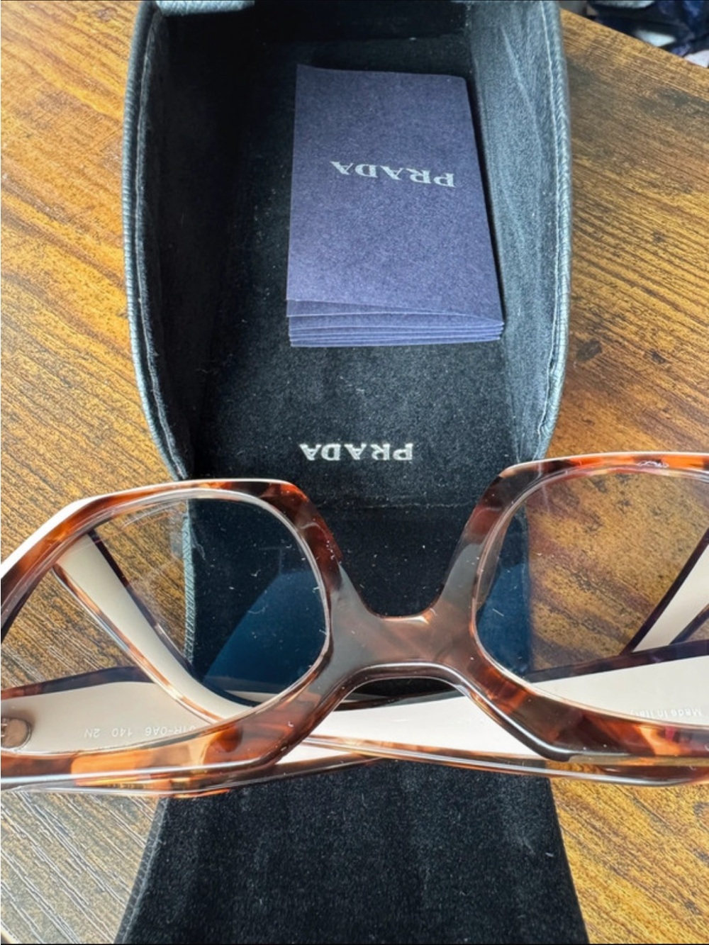 Prada Women’s Tortoiseshell Frame with Pink Temples Sunglasses - Picture 12 of 13